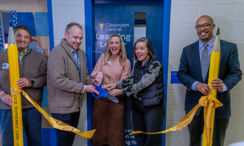 Classroom Central, Charlotte FC and CMS leadership cut a ribbon in front of a Learning Locker